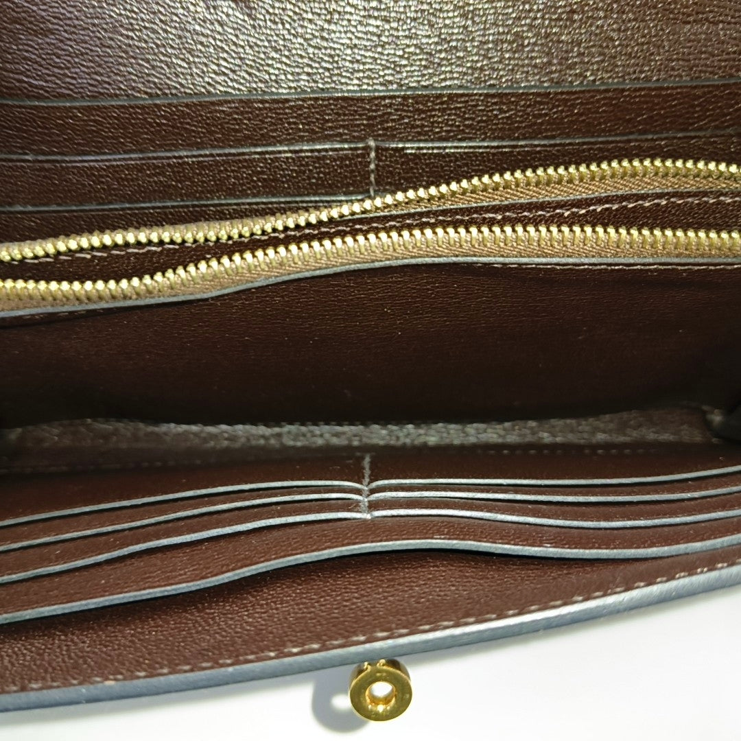 Authenticated pre-owned  Kelly Shiny Porosus Crocodile Brown Wallet - Wallet at Looply