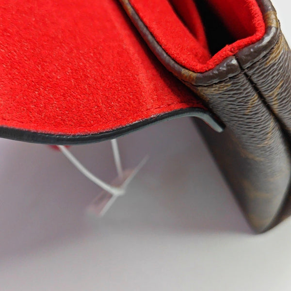 Authenticated pre-owned  Locky BB Monogram Coated Canvas Red - Shoulder Bag at Looply