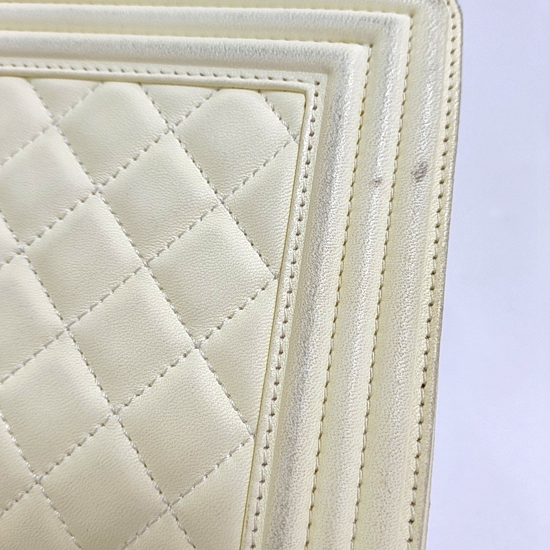 Authenticated pre-owned  Boy Chanel Medium Quilted Lambskin White - Crossbody Bag at Looply
