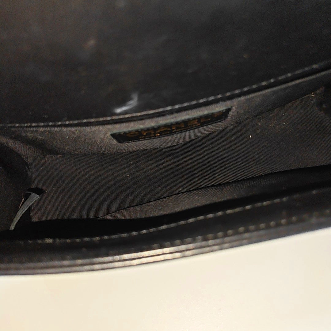 Authenticated pre-owned  Boy Chanel Small Chevron Calfskin Black - Shoulder Bag at Looply