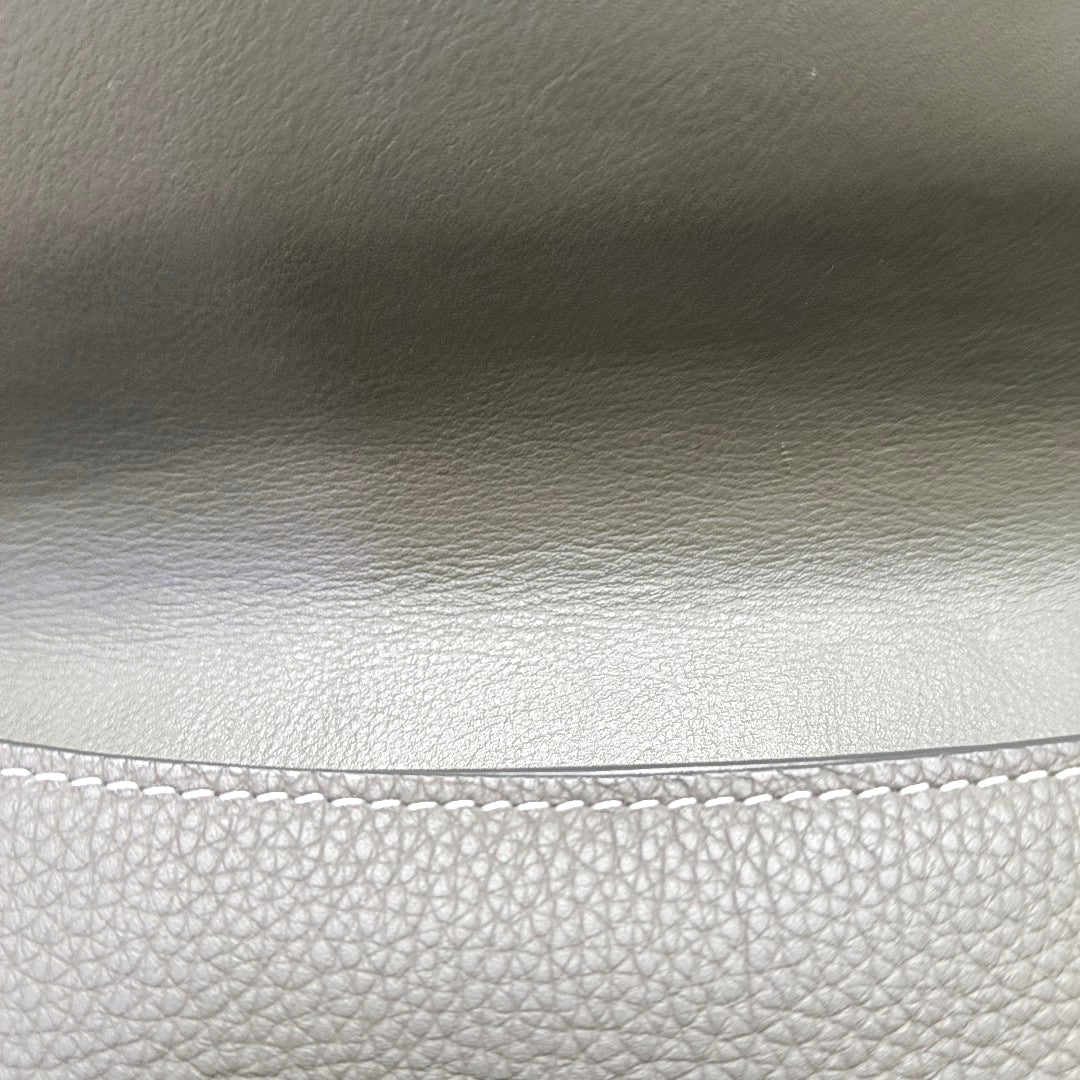 Authenticated pre-owned  Saddle Leather Gray - Clutch at Looply