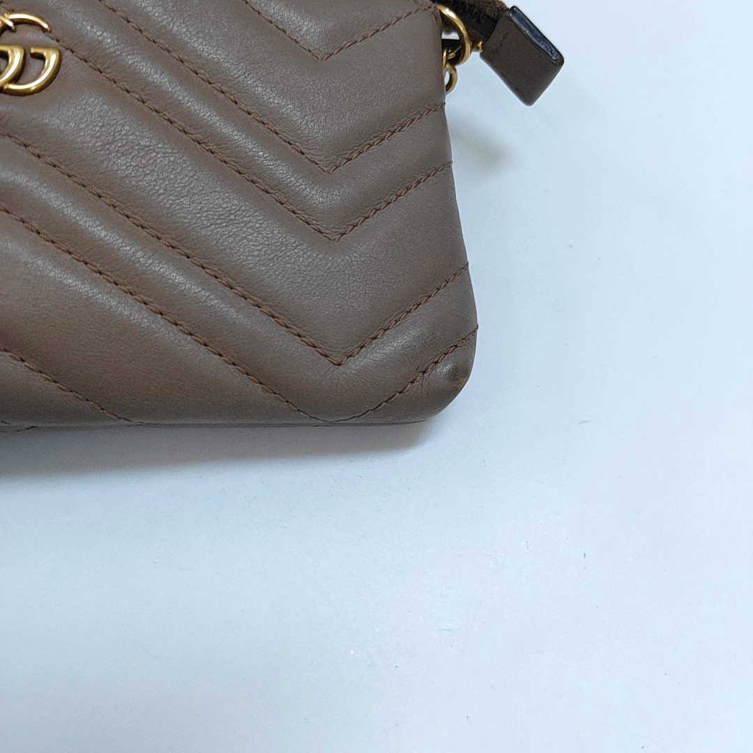 Authenticated pre-owned  GG Marmont Calfskin Beige - Top Handle Bag at Looply