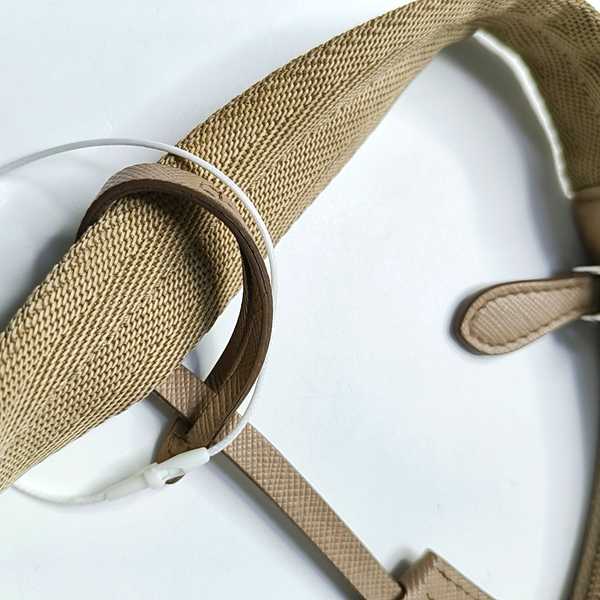 Authenticated pre-owned  Re-edition2000 Mini Nylon Beige - Top Handle Bag at Looply