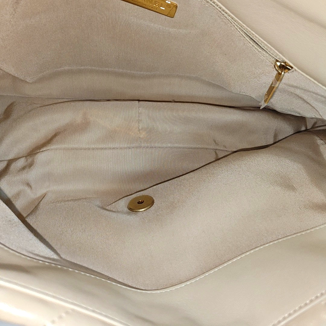 Authenticated pre-owned  Chanel 19 Maxi Quilted Lambskin Beige - Shoulder Bag at Looply