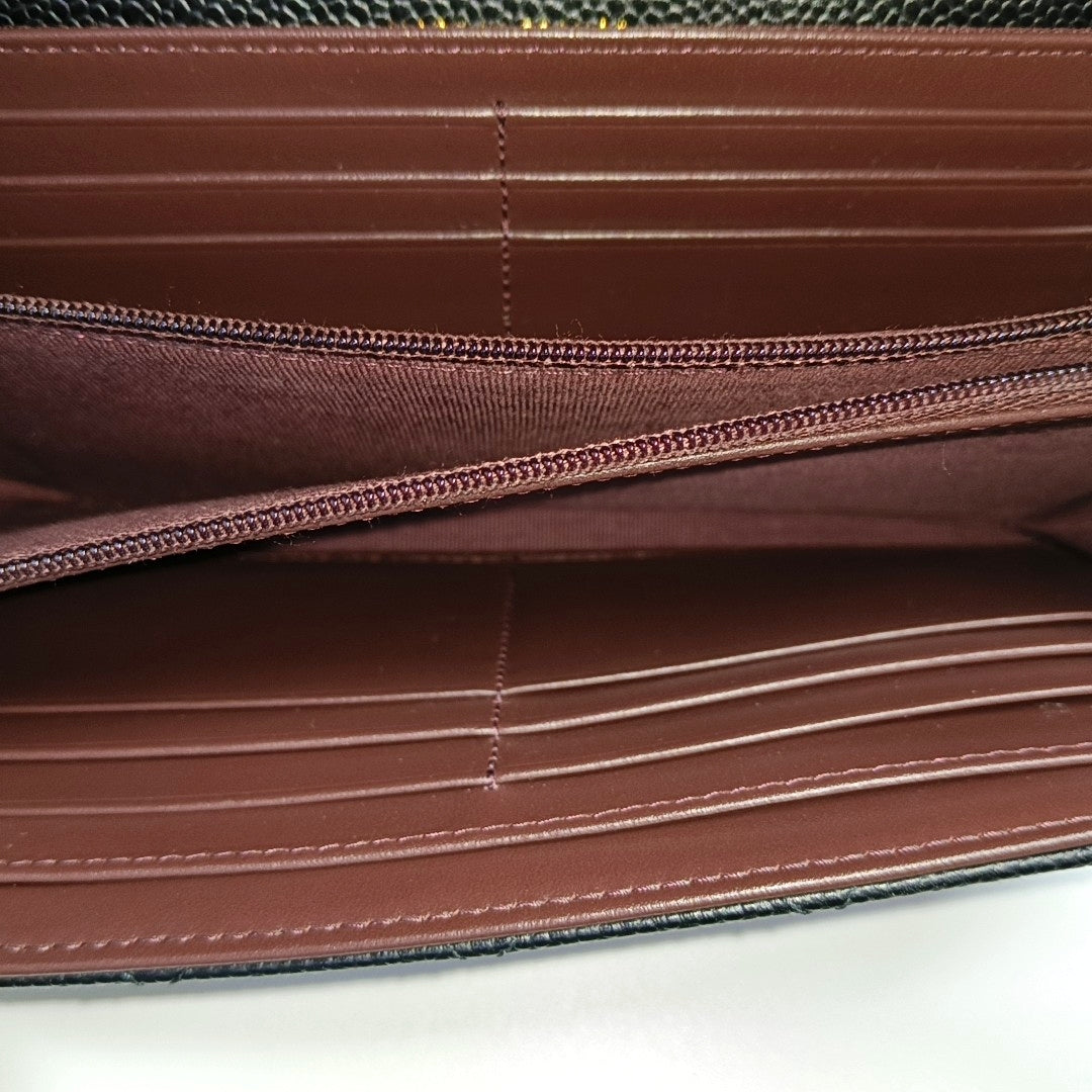 Authenticated pre-owned  Classic Flap Quilted Grained Calfskin Black Wallet - Wallet at Looply