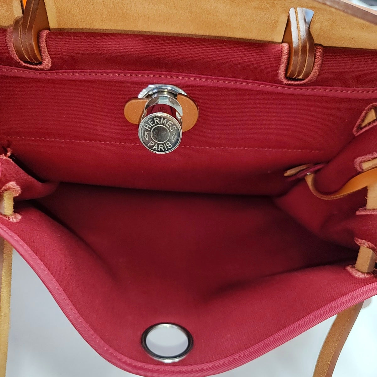 Authenticated pre-owned  Herbag 31 Canvas Red - Handbags at Looply