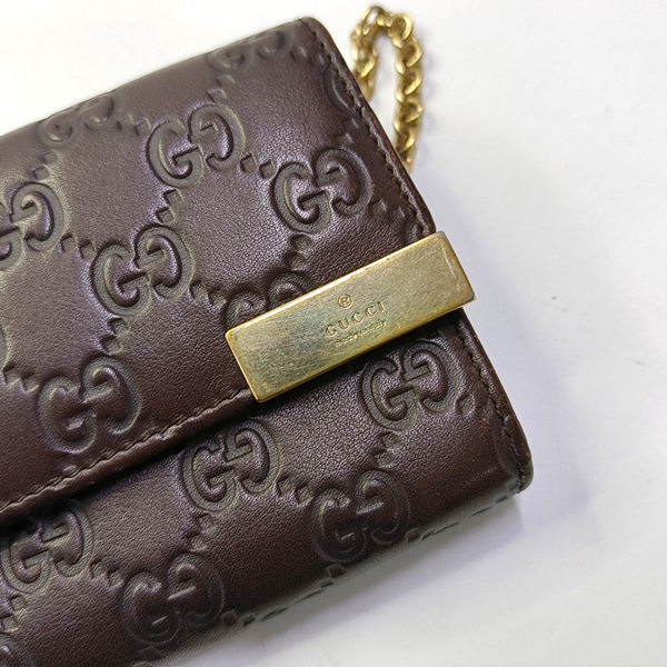 Authenticated pre-owned  Microguccissima Monogram Calfskin Brown - Top Handle Bag at Looply