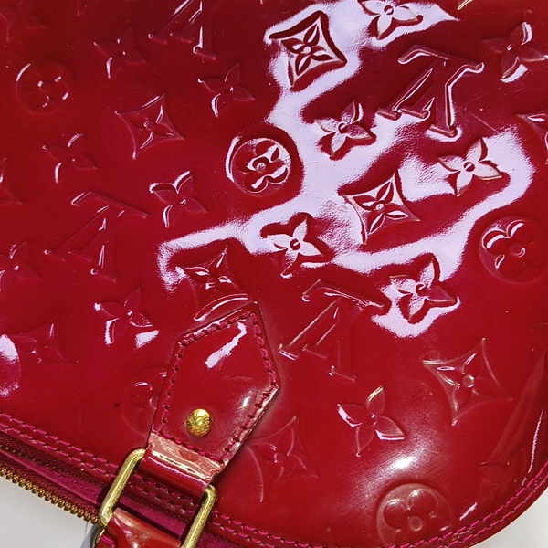 Authenticated pre-owned  Alma PM Monogram Calfskin Red - Top Handle Bag at Looply