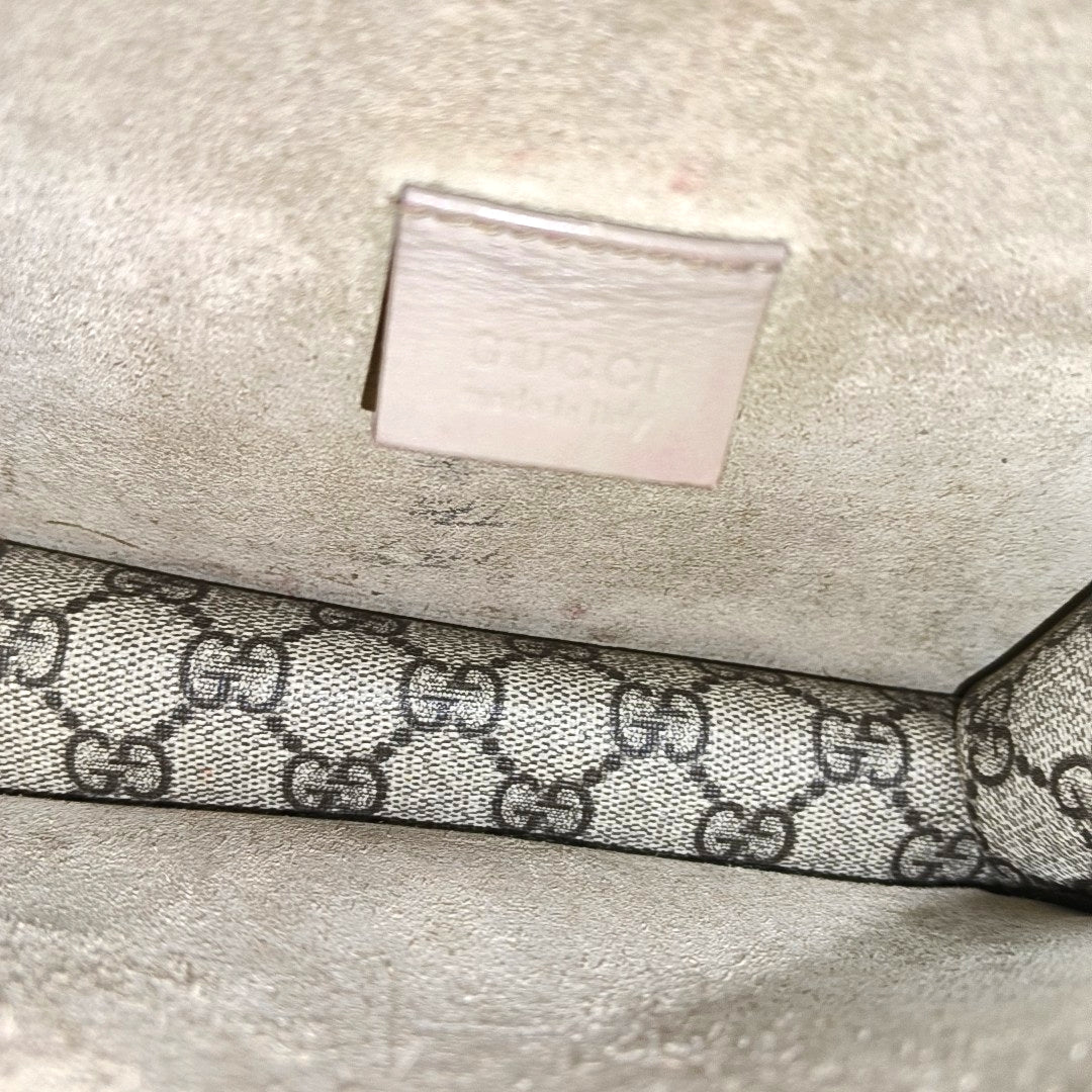 Authenticated pre-owned  Dionysus Super Mini Monogram Coated Canvas Beige - Crossbody Bag at Looply