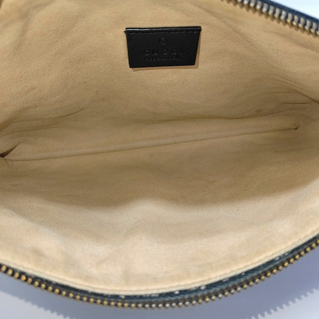 Authenticated pre-owned  GG Marmont Calfskin Black - Clutch at Looply