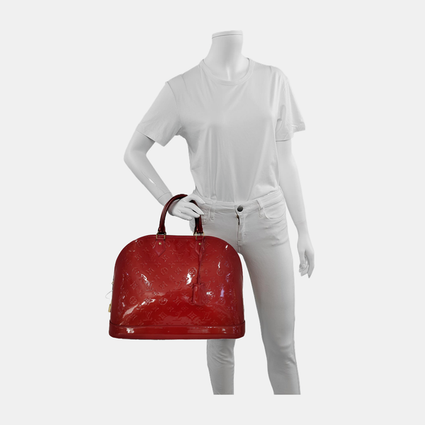 Authenticated pre-owned  Alma GM Patent Leather Red - Top Handle Bag at Looply