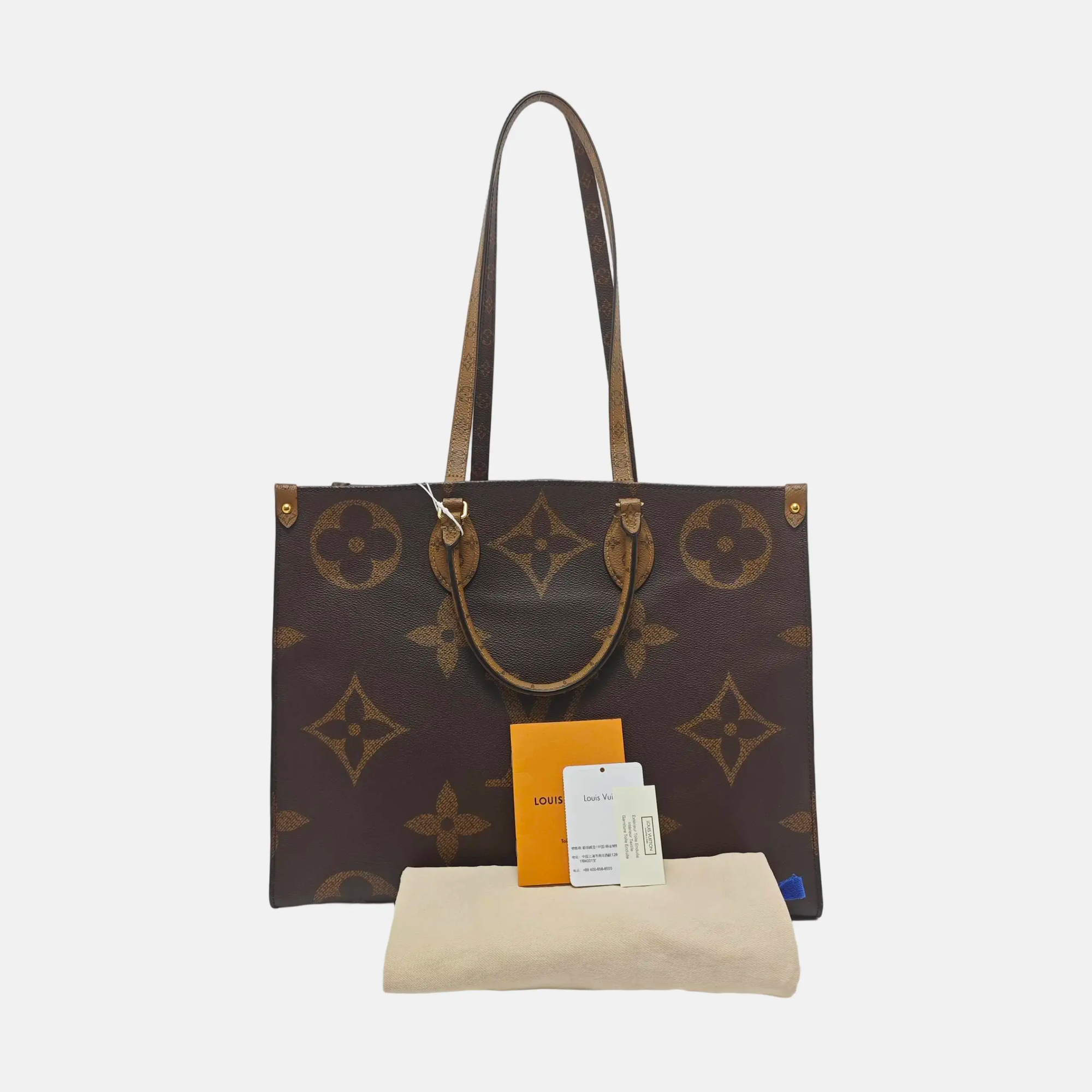 Authenticated pre-owned  Onthego GM Monogram Coated Canvas Brown - Shoulder Bag at Looply