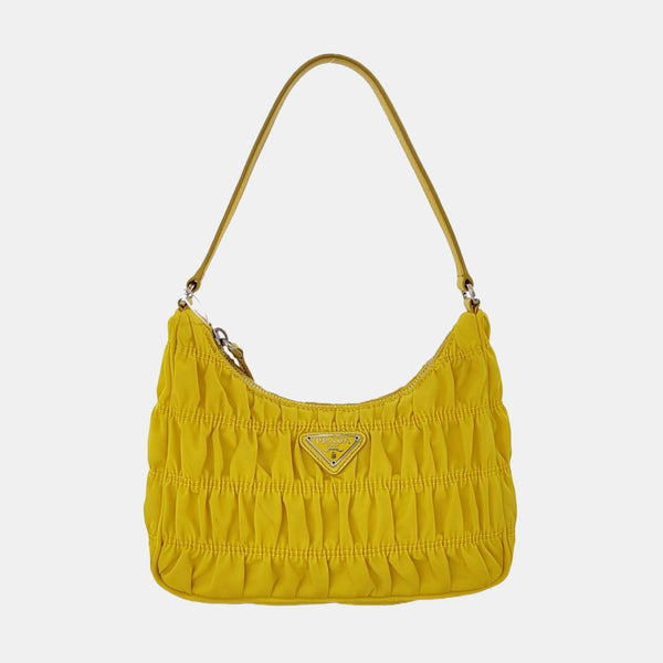 Authenticated pre-owned  Re-edition2005 Mini Nylon Yellow - Top Handle Bag at Looply