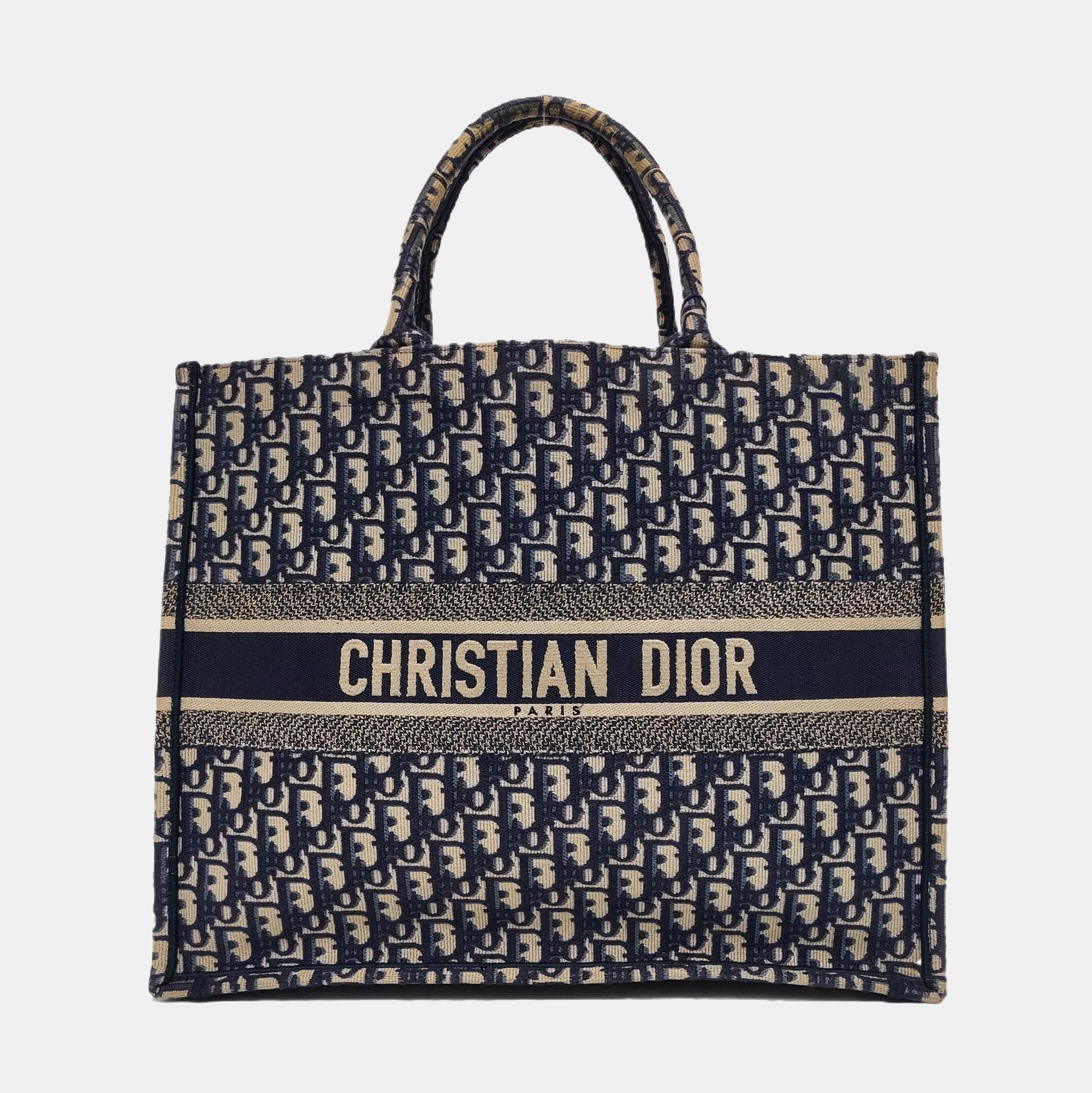 Authenticated pre-owned  Book Tote Large Monogram Canvas Blue - Top Handle Bag at Looply