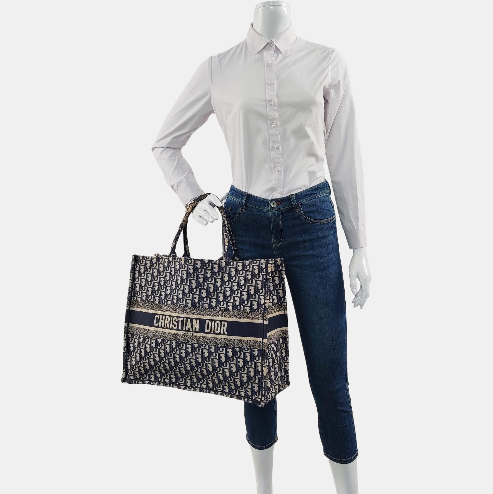Authenticated pre-owned  Book Tote Large Monogram Canvas Blue - Top Handle Bag at Looply