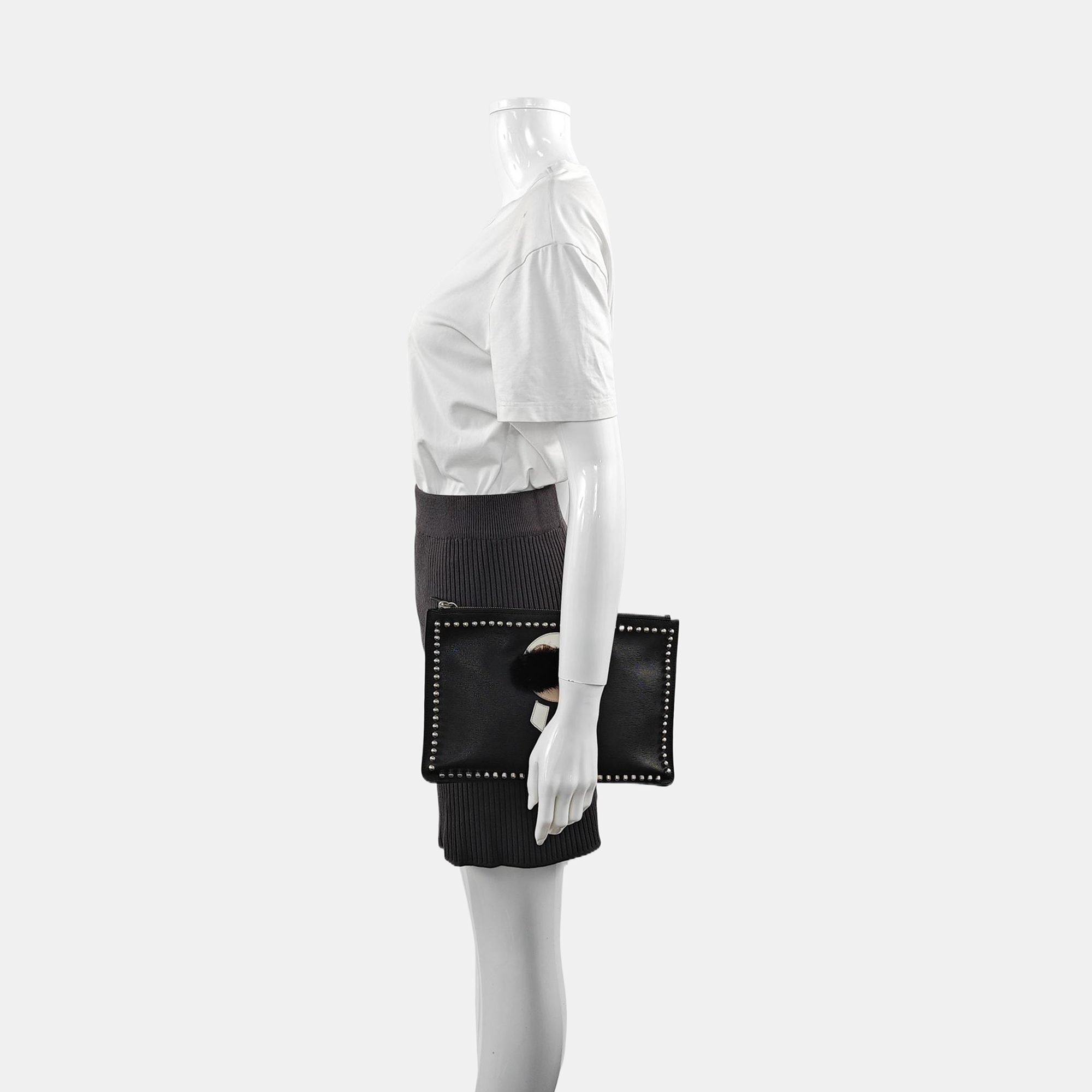 Authenticated pre-owned  Karlito Calfskin Black - Clutch at Looply