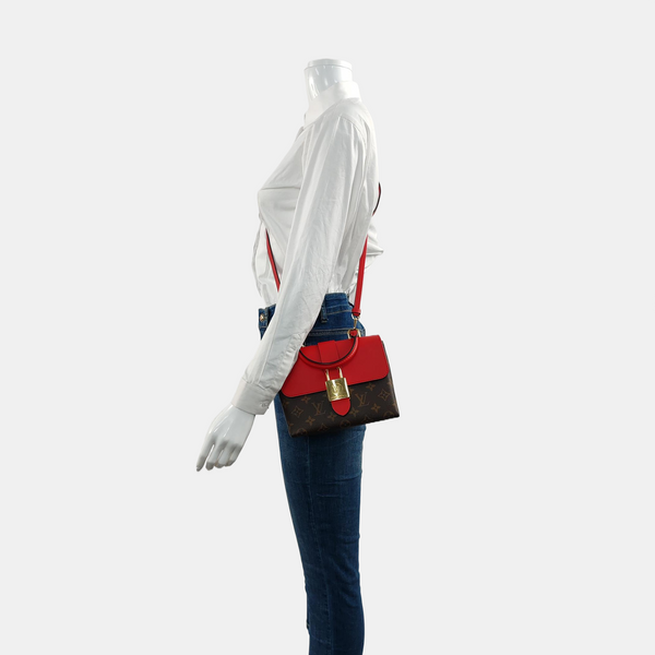 Authenticated pre-owned  Locky BB Monogram Coated Canvas Red - Shoulder Bag at Looply