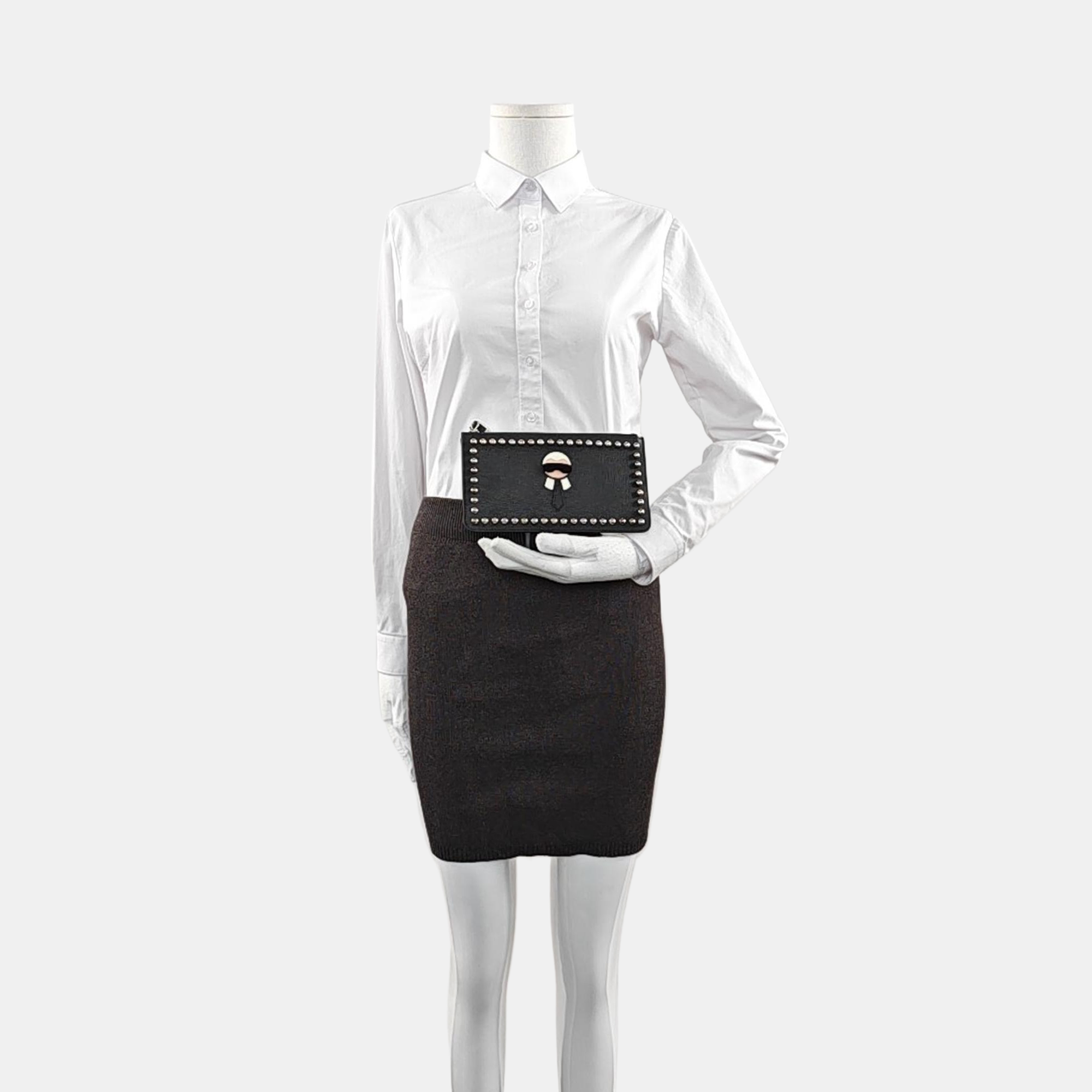 Authenticated pre-owned  Karlito Calfskin Black - Clutch at Looply