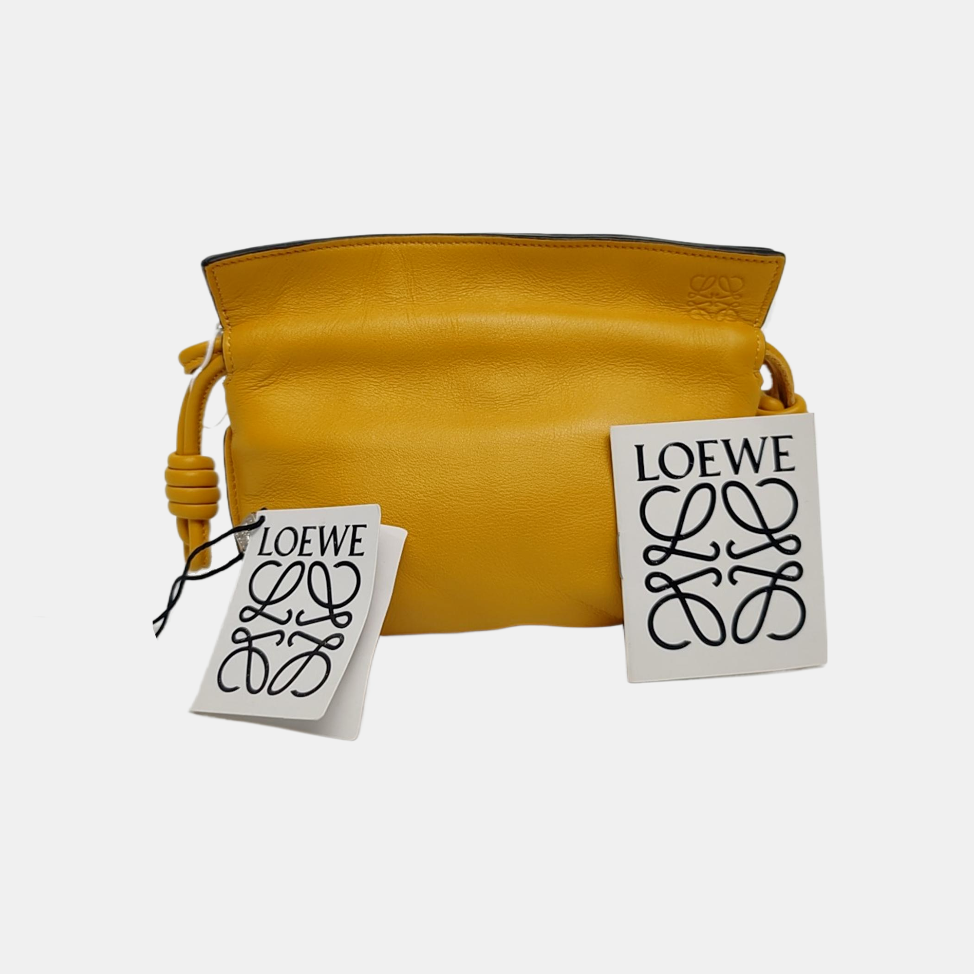 Authenticated pre-owned  Flamenco Calfskin Yellow - Clutch at Looply