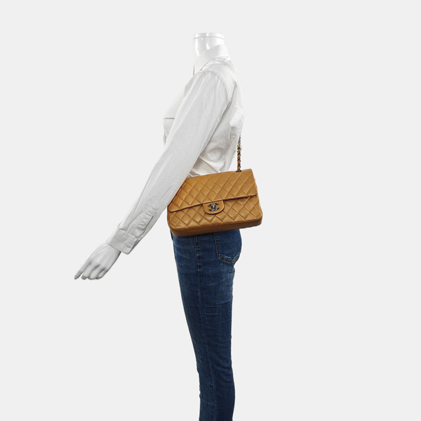 Authenticated pre-owned  Classic Flap Medium Quilted Grained Calfskin Orange - Shoulder Bag at Looply