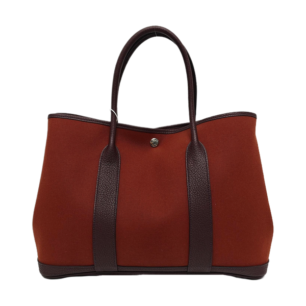 Authenticated pre-owned  Garden Party Canvas Red - Top Handle Bag at Looply