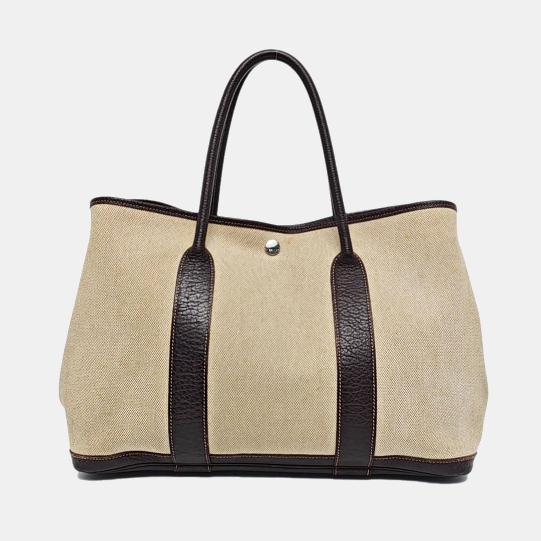 Authenticated pre-owned  Garden Party 36 Canvas Beige - Top Handle Bag at Looply