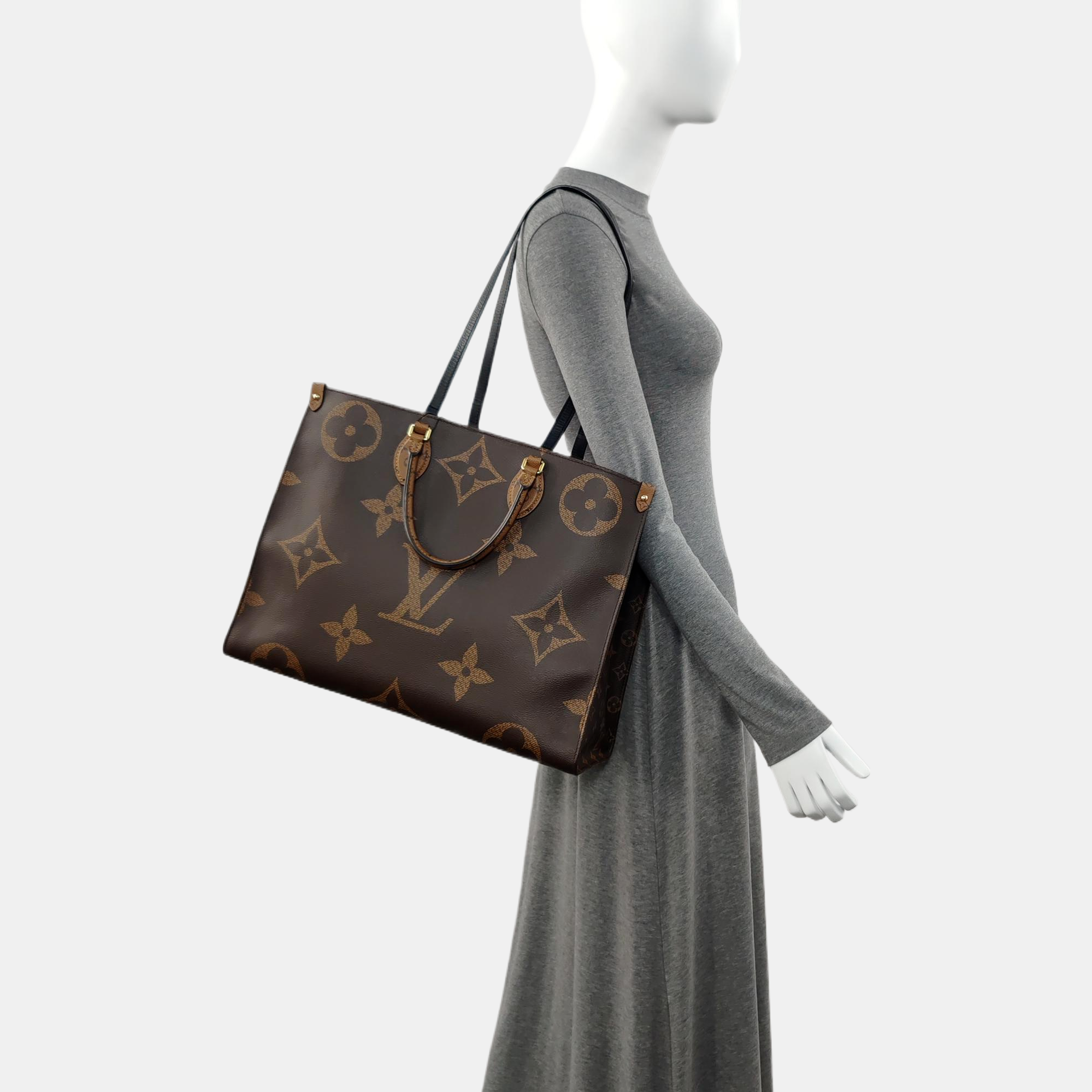 Authenticated pre-owned  Onthego GM Monogram Coated Canvas Brown - Shoulder Bag at Looply