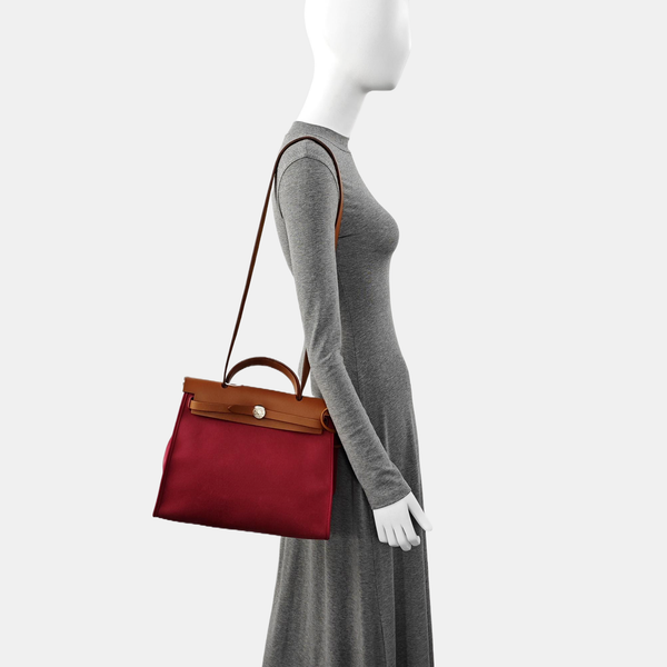 Authenticated pre-owned  Herbag 31 Canvas Red - Shoulder Bag at Looply