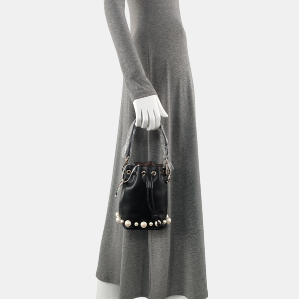 Authenticated pre-owned  Mon Tresor Small Calfskin Black - Top Handle Bag at Looply
