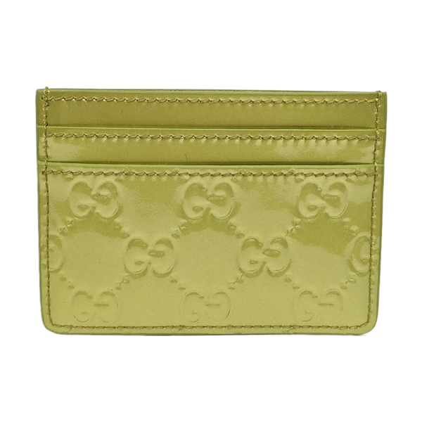 Authenticated pre-owned  Microguccissima Monogram Calfskin Yellow Card Holder - Card Holder at Looply