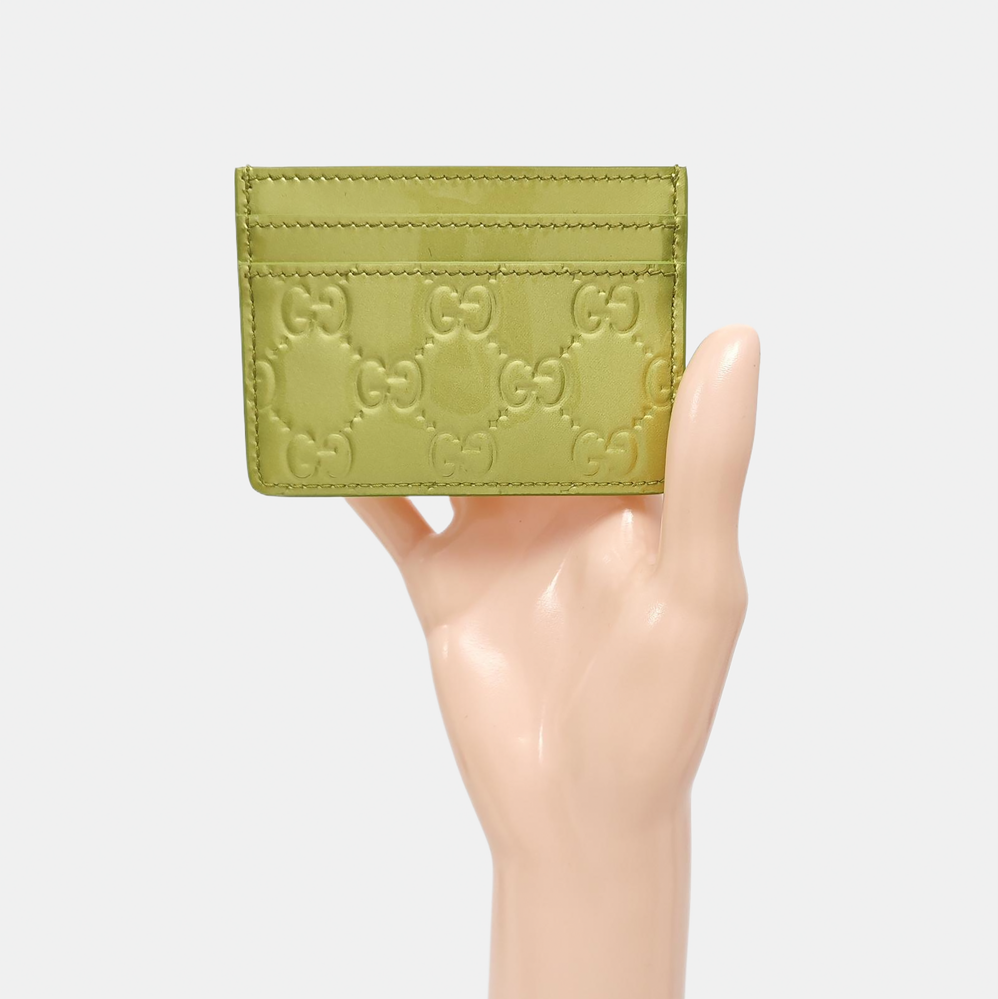 Authenticated pre-owned  Microguccissima Monogram Calfskin Yellow Card Holder - Card Holder at Looply